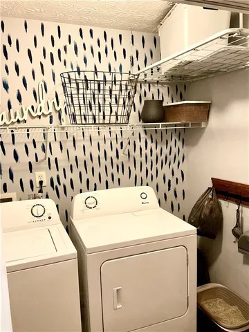 a bedroom with bed and a window