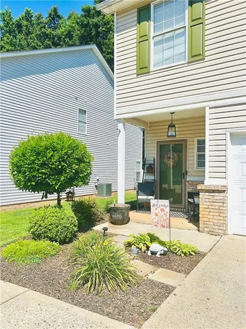 front view of a house and a yard