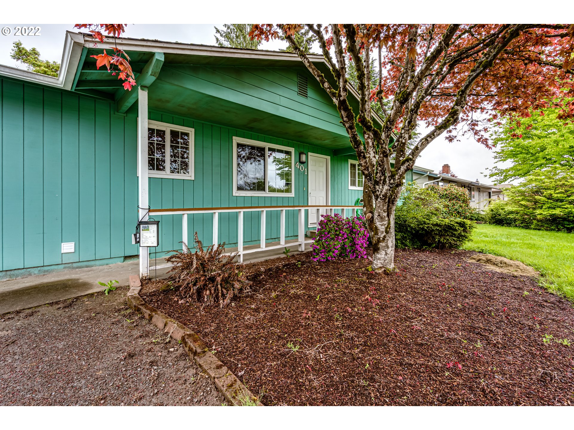 401 U Street Springfield, OR 97477 - Photo 2 of 29 a view of a house with a backyard