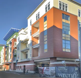 a view of a building with a street