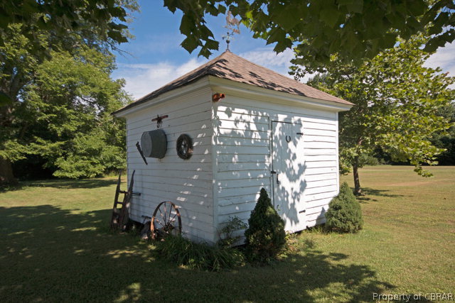 3918 East River Road Cardinal, VA 23025 - Photo 32 of 37 a front view of a house with a yard