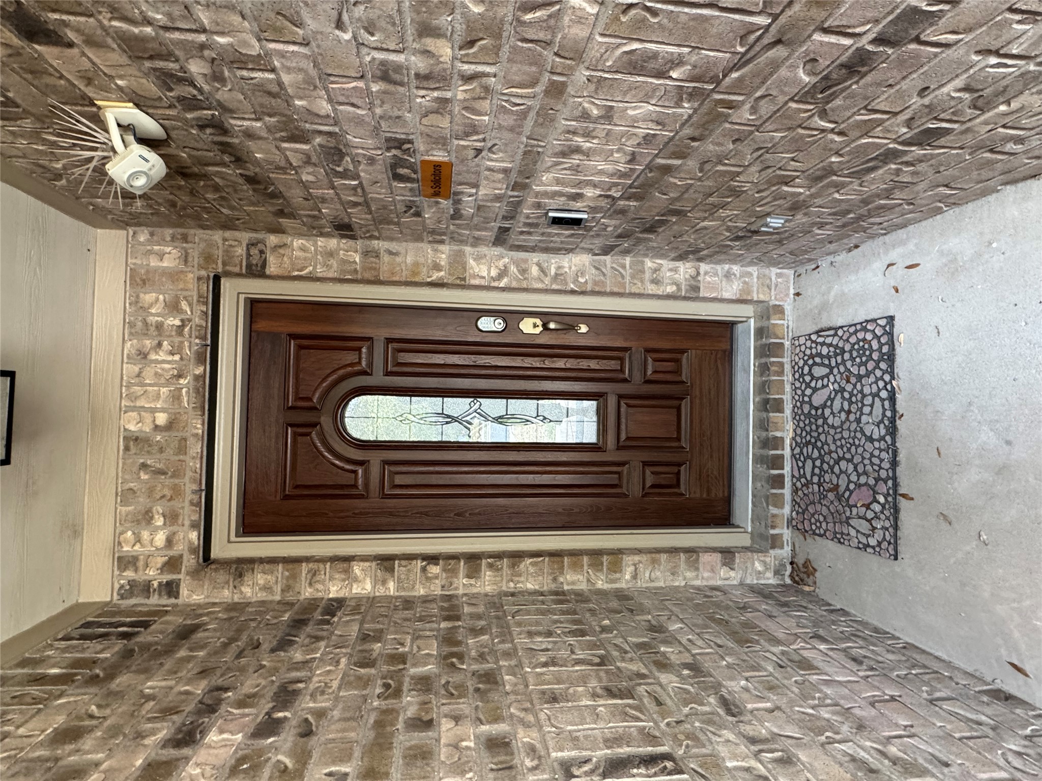 112 Eagle Owl Loop Leander, TX 78641 - Photo 2 of 17 View of exterior entry featuring bricked exterior. Just to the right is the covered porch.