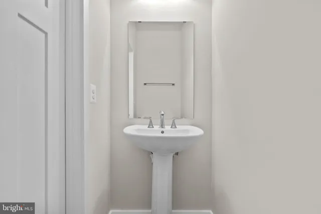 a view of a balcony with wooden fence