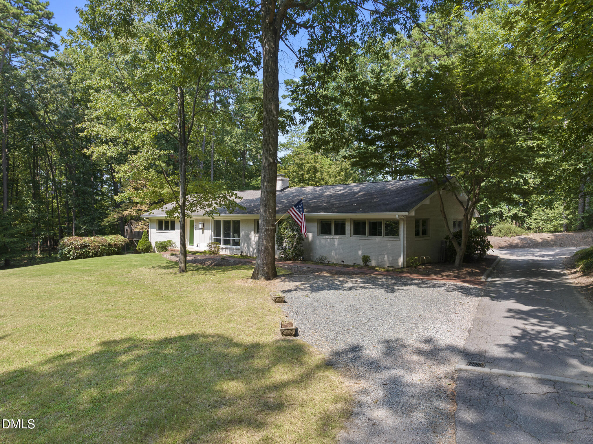 1605 Ridge Road Raleigh, NC 27607 - Photo 2 of 34 a view of a house with a yard
