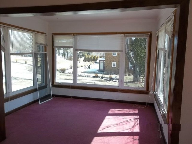 1403 Ogilby Road Rockford, IL 61102 - Photo 7 of 7 a view of a room with large windows