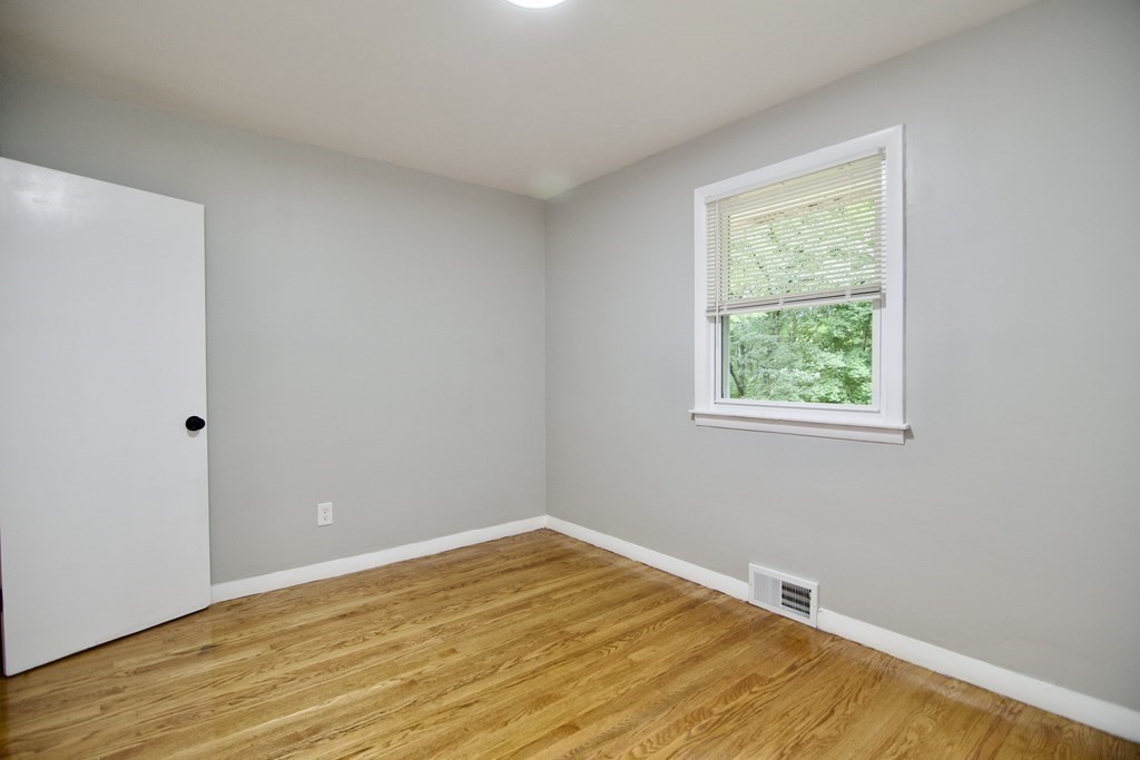 11 Aberdeen Road Springfield, MA 01109 - Photo 19 of 42 an empty room with a window