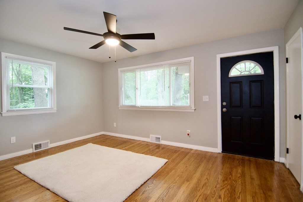 11 Aberdeen Road Springfield, MA 01109 - Photo 3 of 42 a view of a room with wooden floor and windows