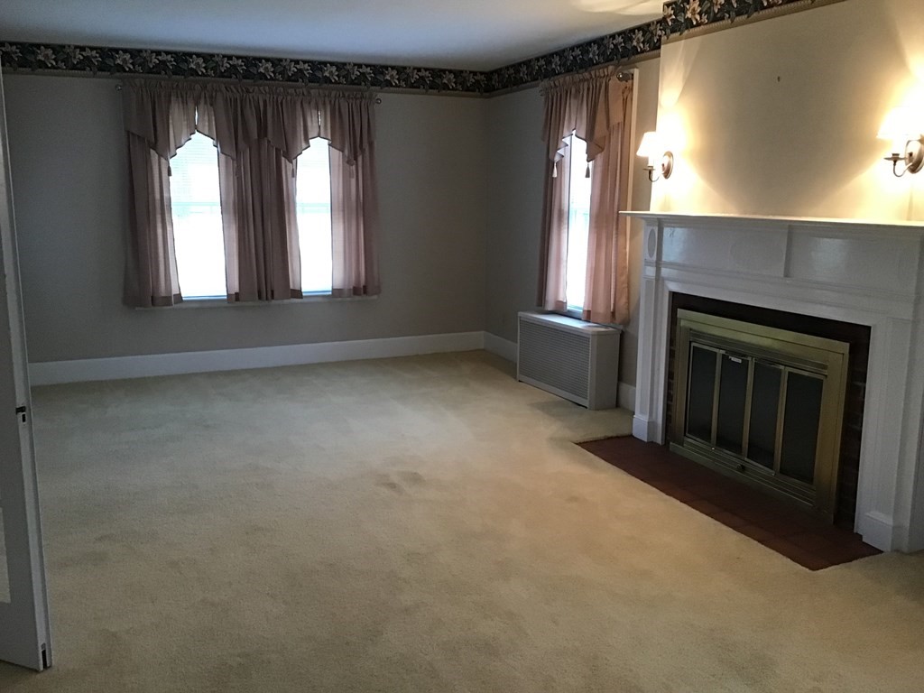 1800 Barre Road Hardwick, MA 01031 - Photo 16 of 20 a view of empty room with a fireplace