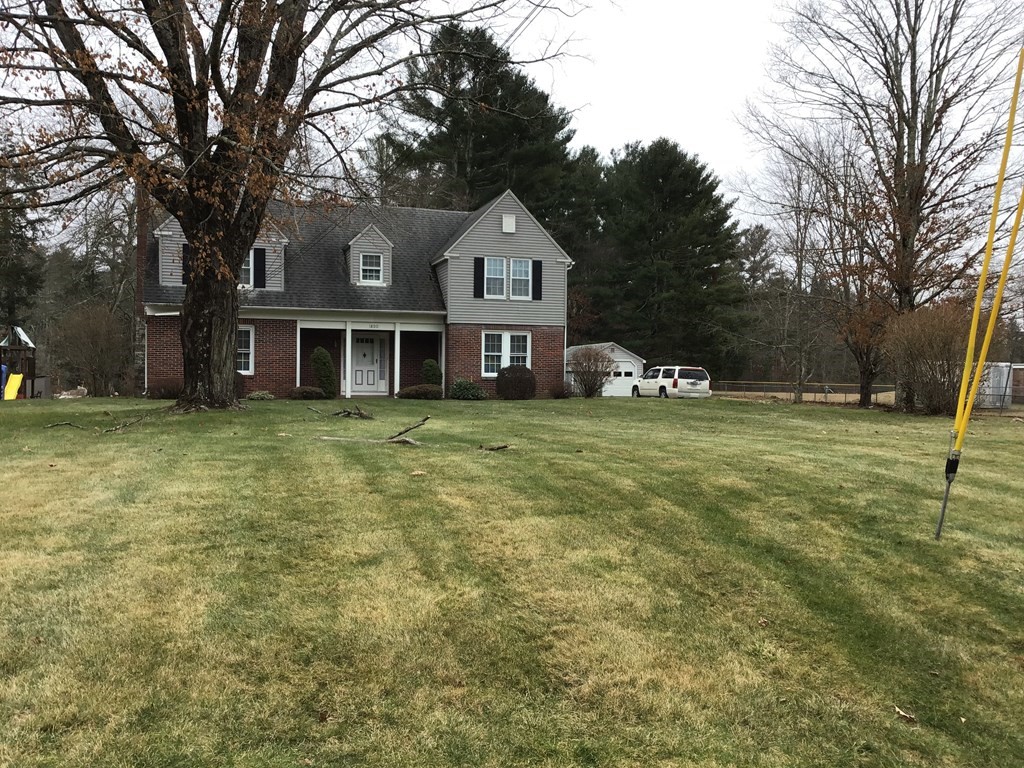 1800 Barre Road Hardwick, MA 01031 - Photo 2 of 20 a front view of a house with a yard