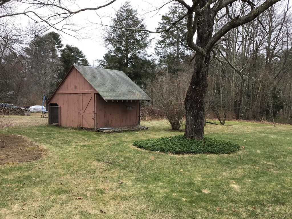 1800 Barre Road Hardwick, MA 01031 - Photo 7 of 20 a backyard of a house with lots of green space