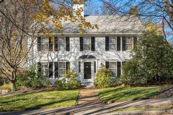 front view of a house with a yard