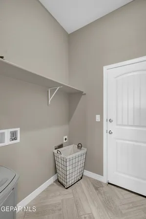 a room with wooden cabinet and a window