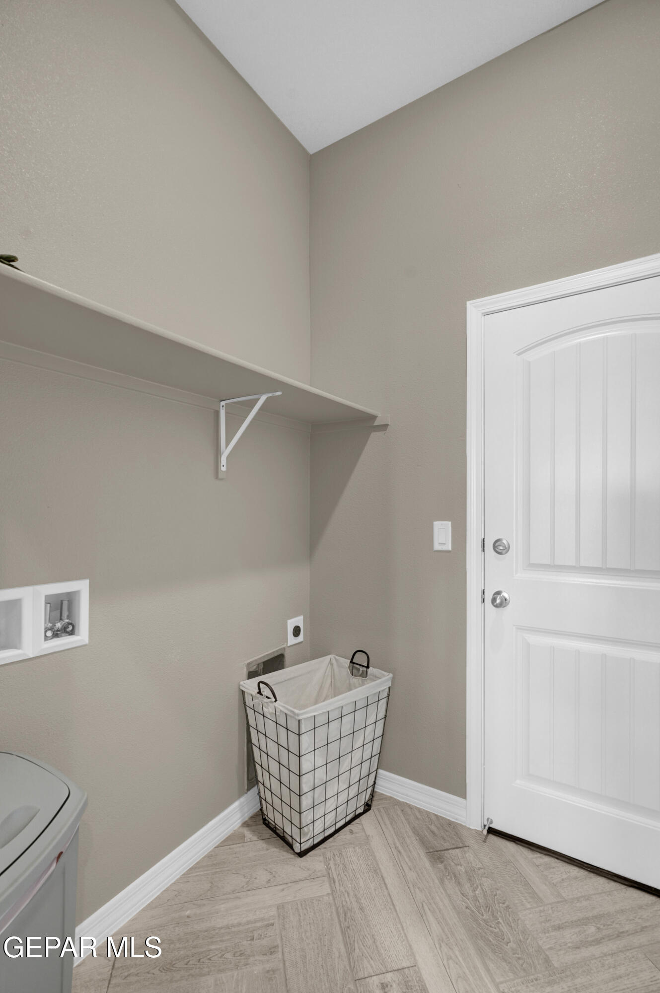 6958 Levee Circle El Paso, TX 79932 - Photo 15 of 55 a room with wooden cabinet and a window