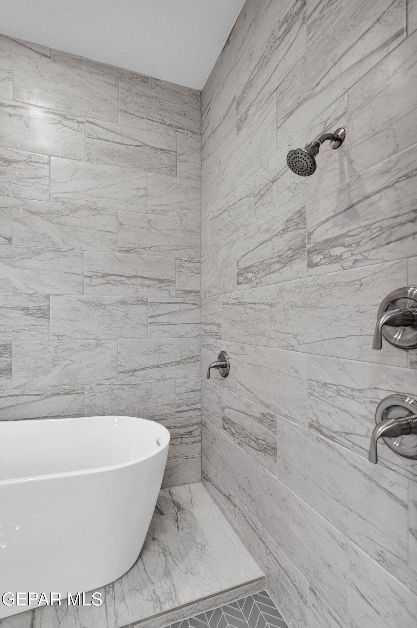 6958 Levee Circle El Paso, TX 79932 - Photo 32 of 55 a white bath tub sitting in a bathroom