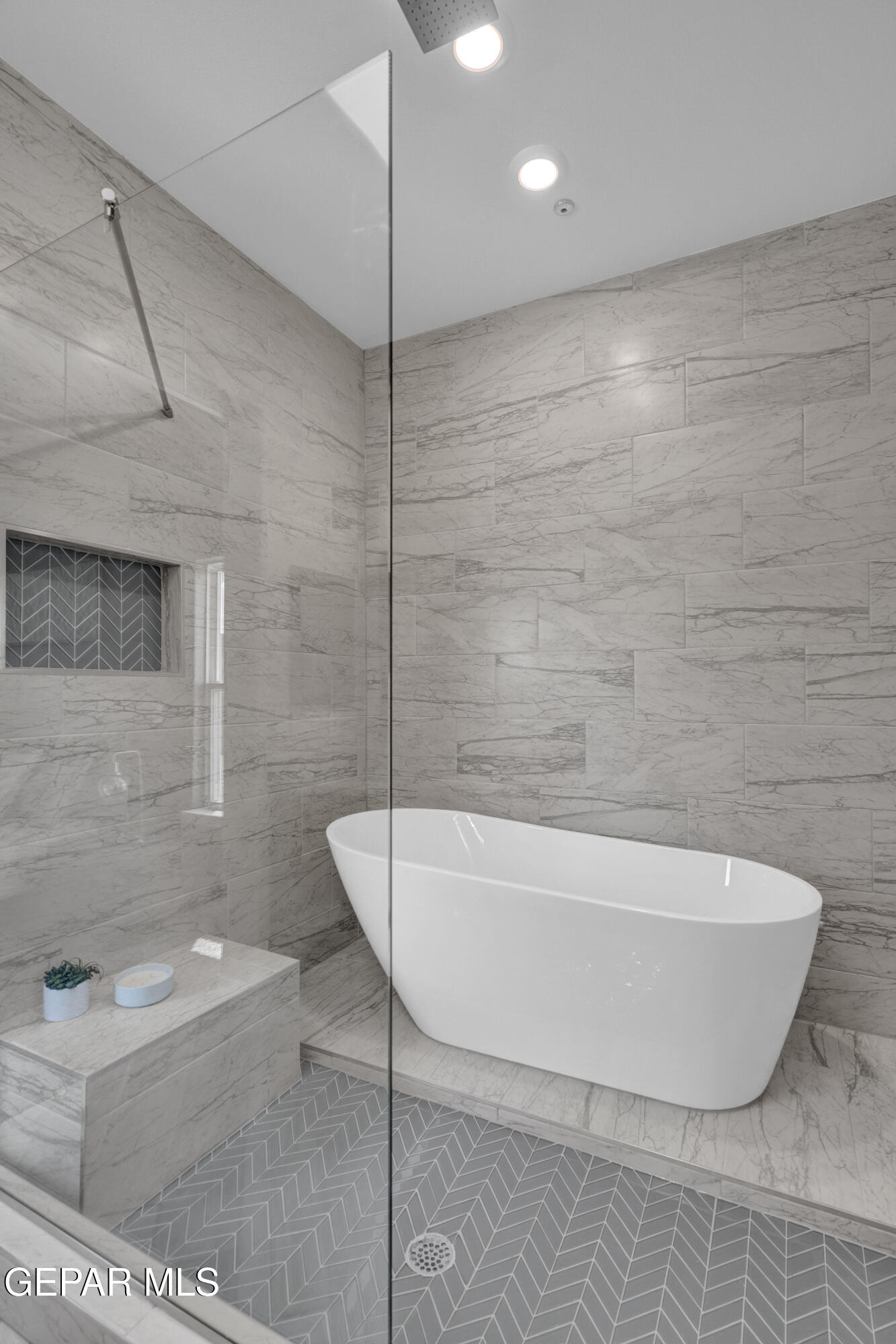 6958 Levee Circle El Paso, TX 79932 - Photo 33 of 55 a white bath tub sitting in a bathroom