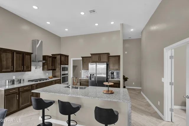 a kitchen with counter space cabinets and appliances