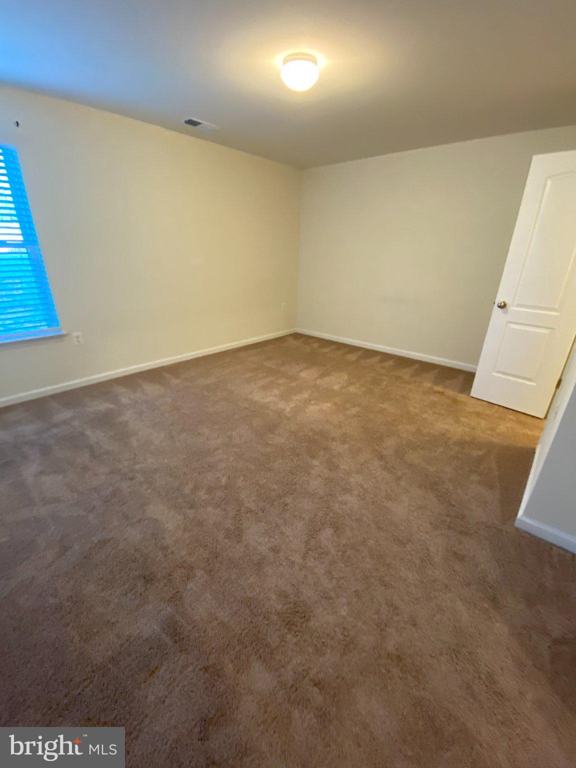 697 Rivanna Run Falling Waters, WV 25419 - Photo 41 of 44 an empty room with a bench