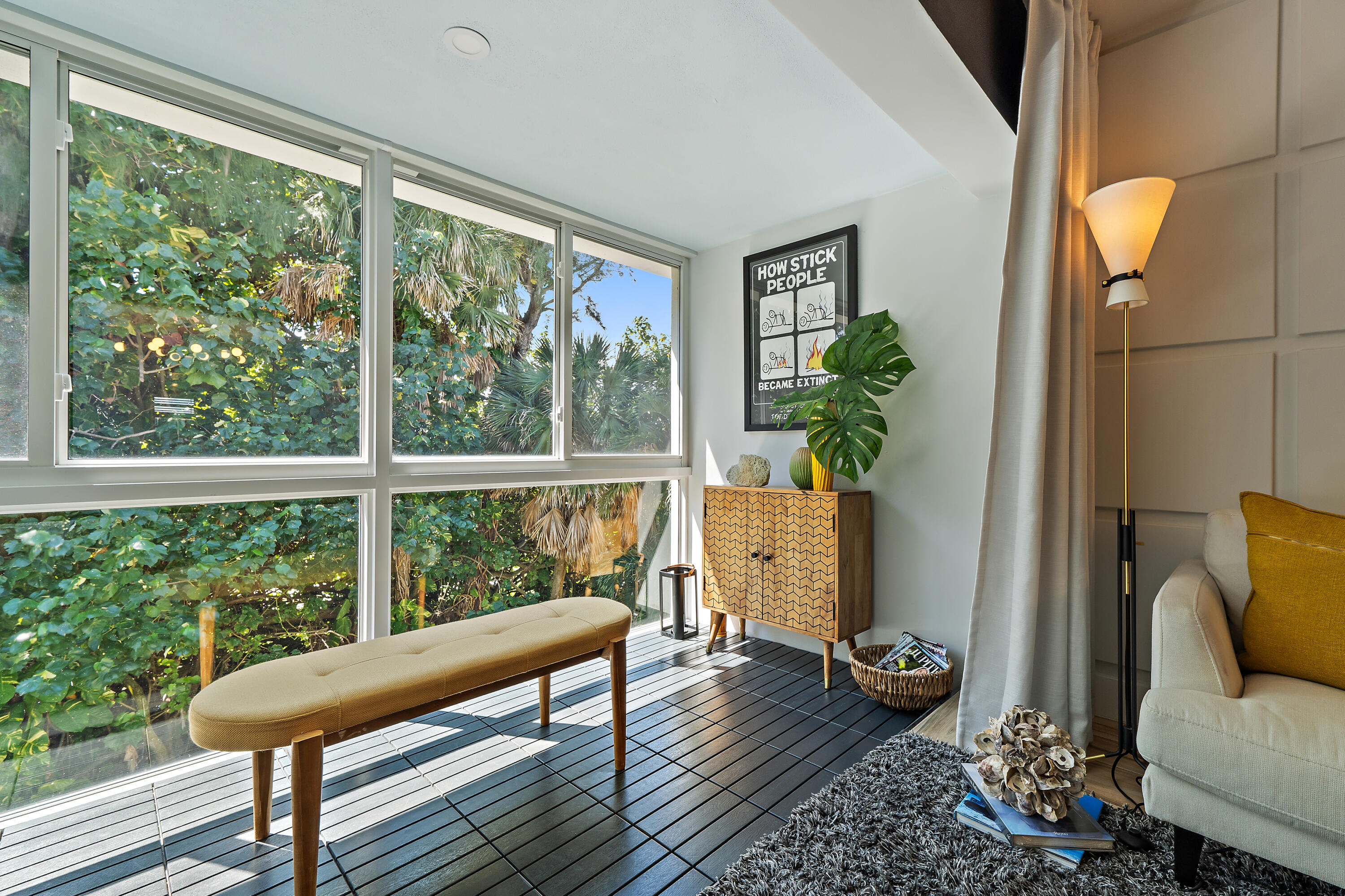 50 Celestial Way, Unit 310 Juno Beach, FL 33408 - Photo 13 of 33 a living room with furniture and a window