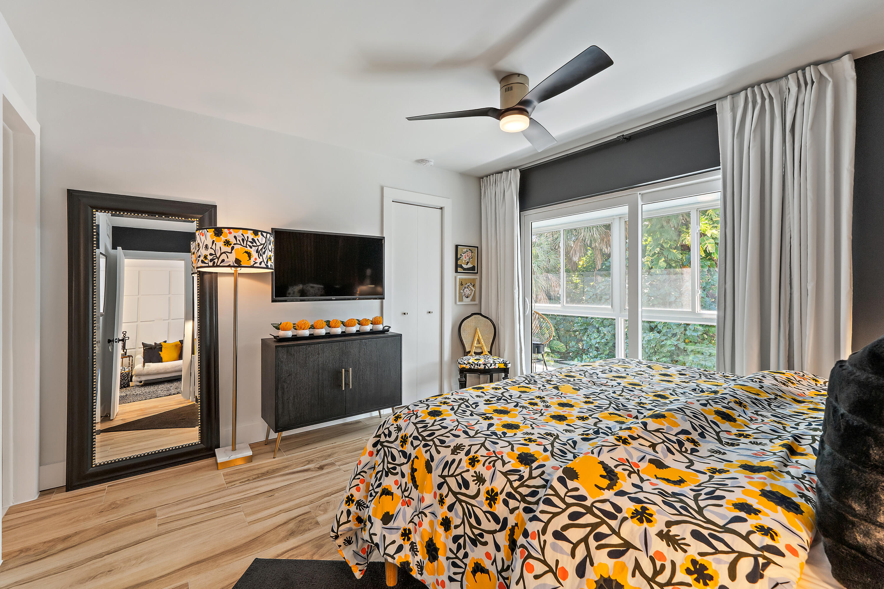 50 Celestial Way, Unit 310 Juno Beach, FL 33408 - Photo 18 of 33 a bed room with a bed and a television