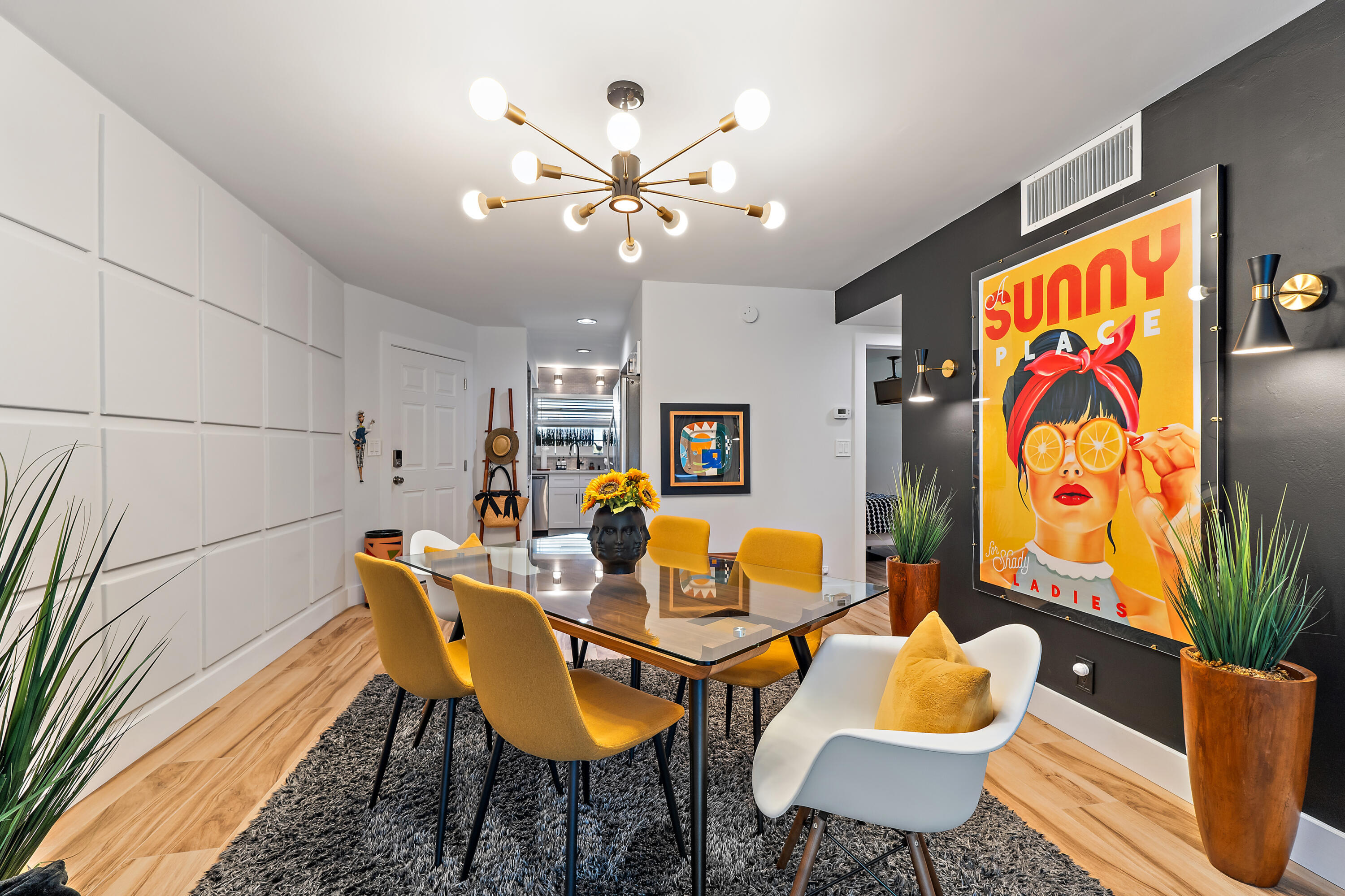 50 Celestial Way, Unit 310 Juno Beach, FL 33408 - Photo 2 of 33 a dining room with furniture and painting on the wall