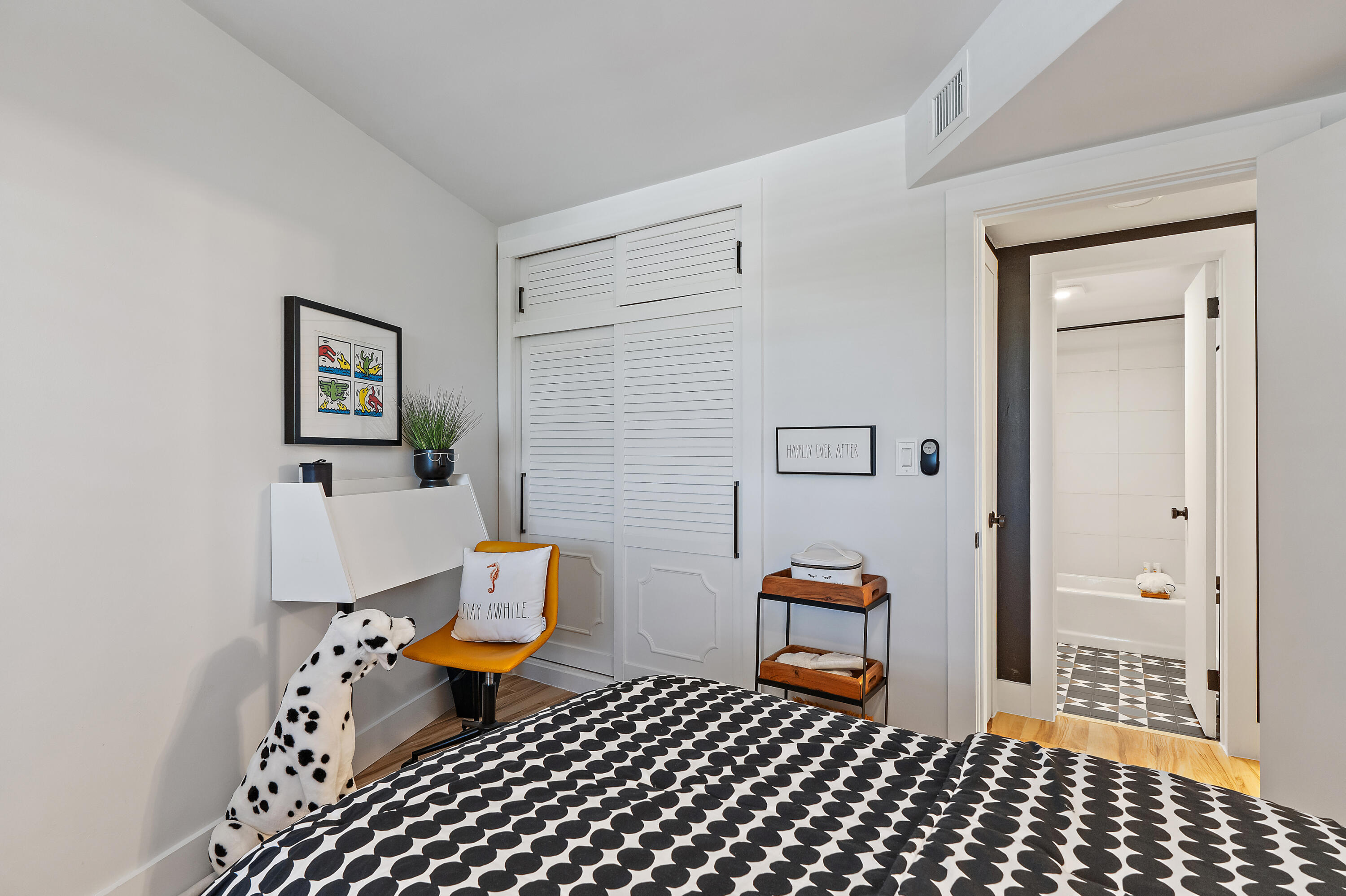 50 Celestial Way, Unit 310 Juno Beach, FL 33408 - Photo 25 of 33 a bedroom with furniture and window