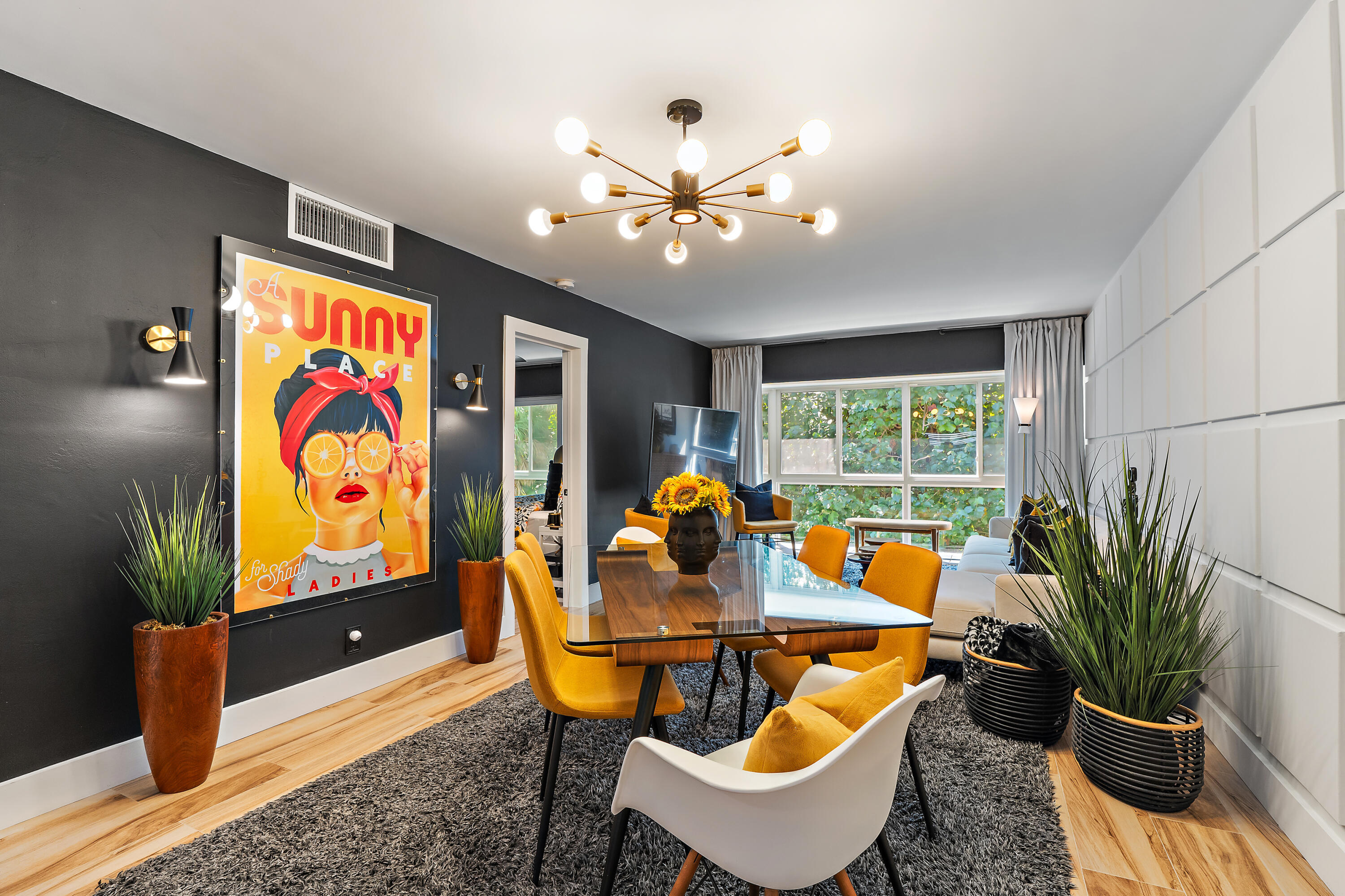 50 Celestial Way, Unit 310 Juno Beach, FL 33408 - Photo 7 of 33 a living room with patio furniture and a potted plant