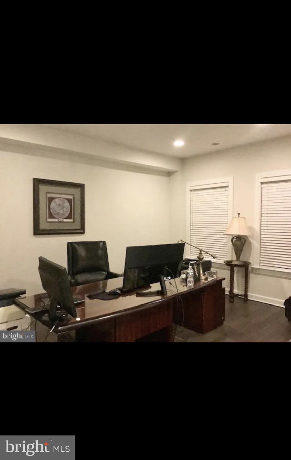 22283 Philanthropic Drive Ashburn, VA 20148 - Photo 12 of 17 a living room with furniture and wooden floor