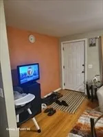 a bedroom with a bed and a table in it