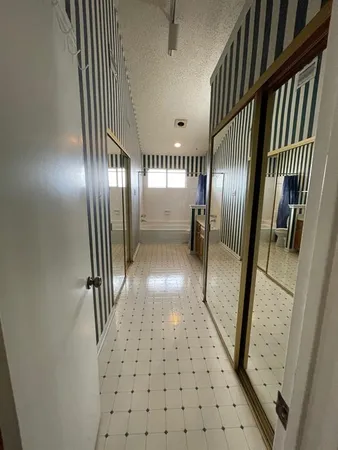 a view of gallery with stairs