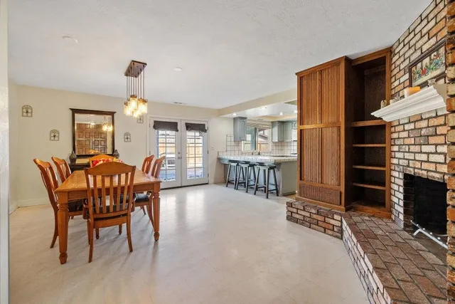 a view of a livingroom with furniture and window