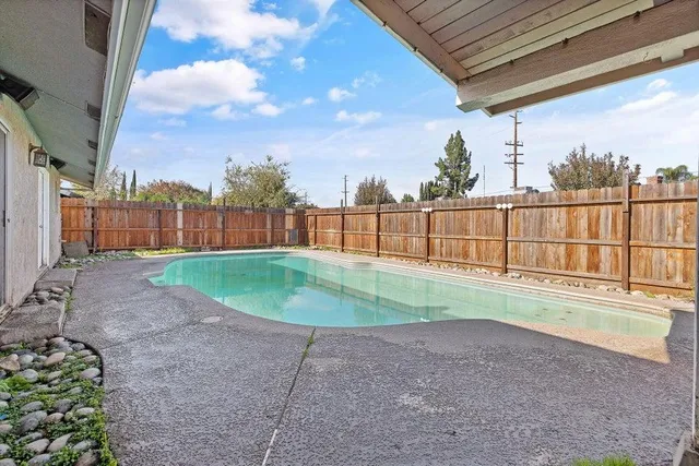 a view of a backyard with a garden