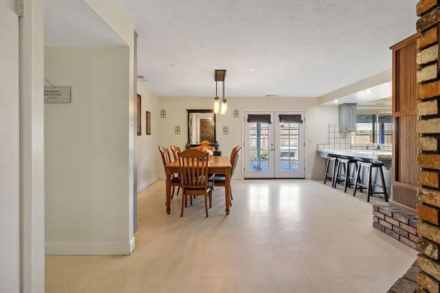 a view of a livingroom with furniture and window