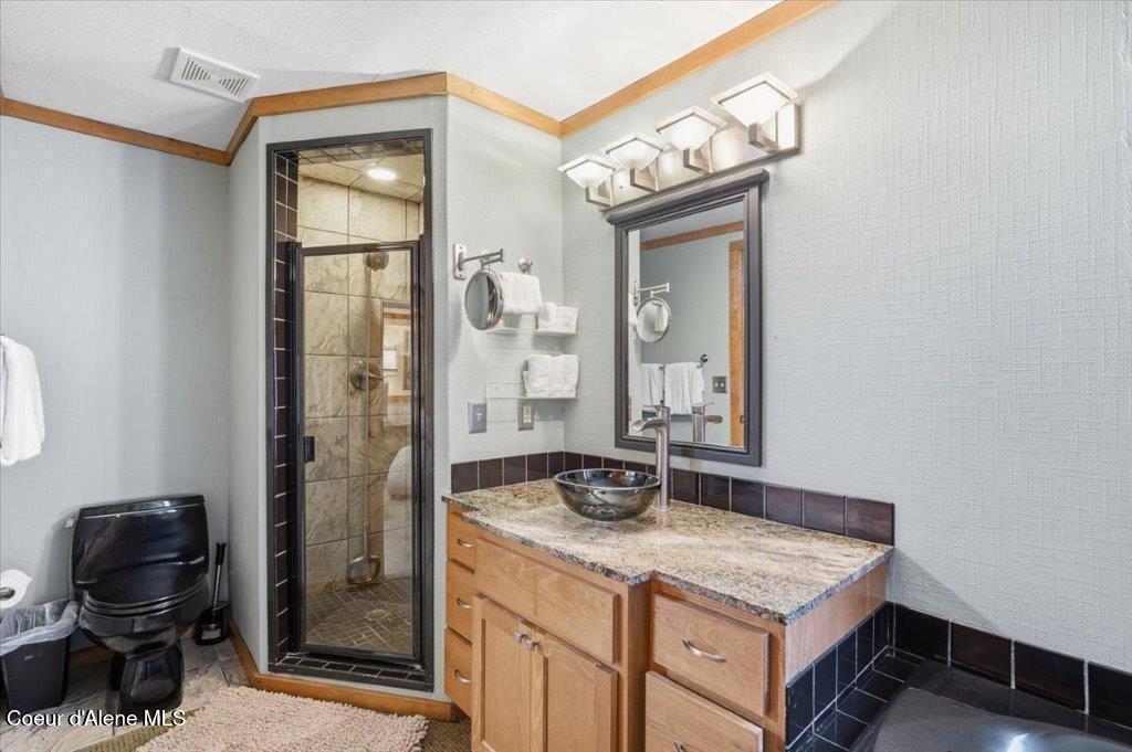 34129 Scenic Bay Road Bayview, ID 83803 - Photo 43 of 69 34-Primary bathroom