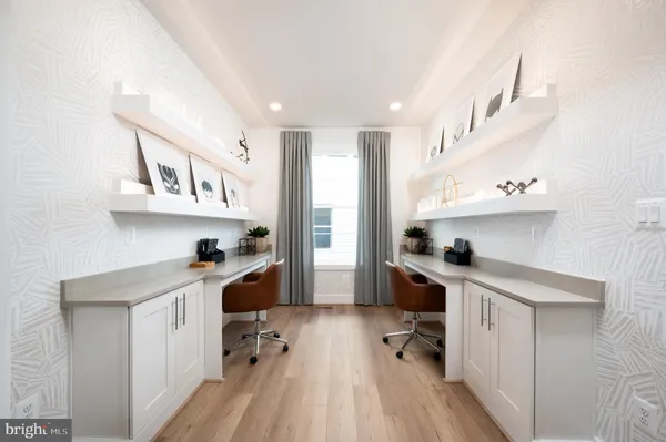 a open kitchen with cabinets a sink and appliances