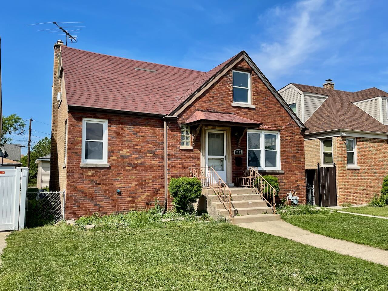 7304 West 57th Street Summit, IL 60501 - Photo 2 of 32 a front view of a house with a yard