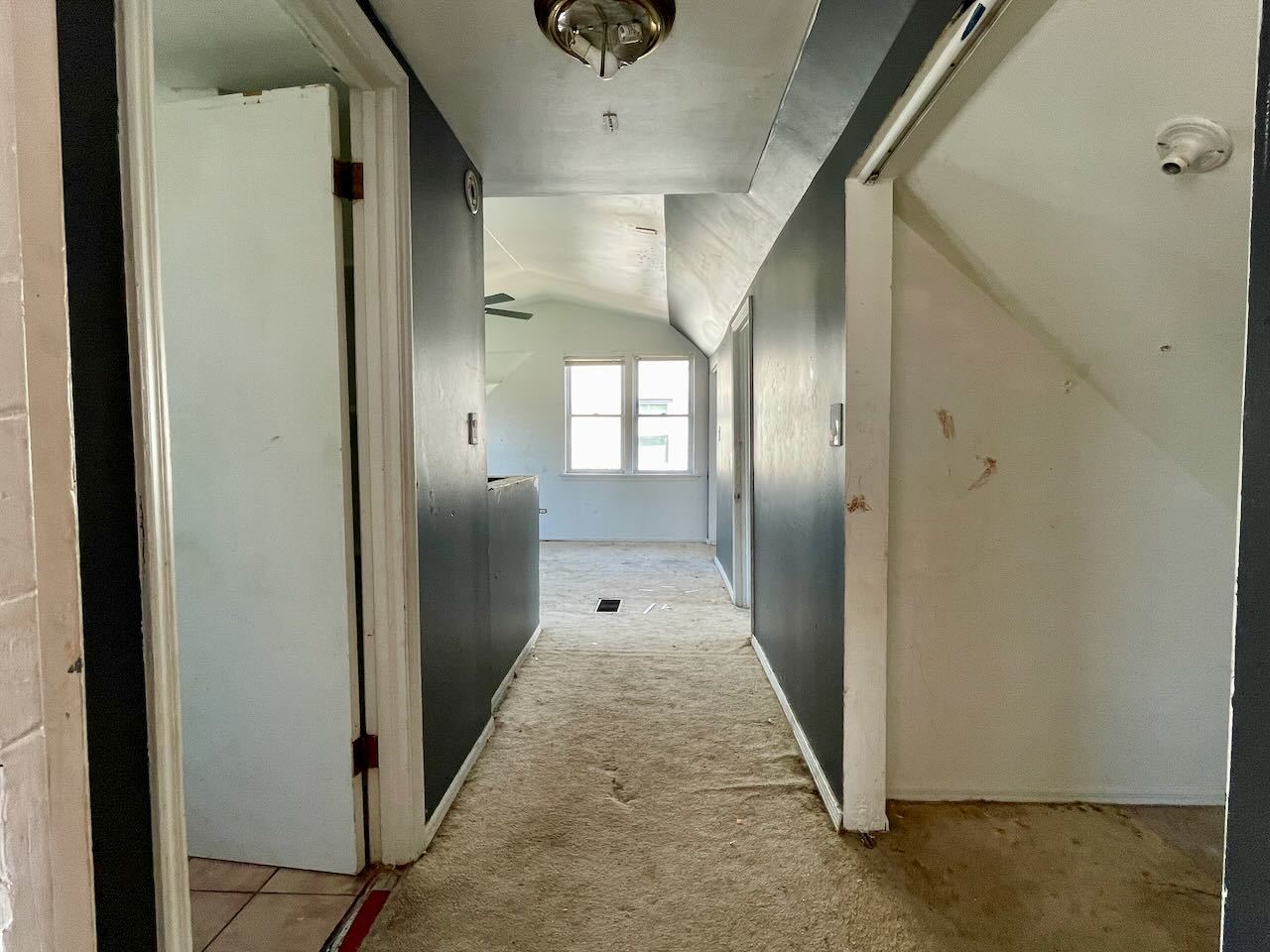 7304 West 57th Street Summit, IL 60501 - Photo 21 of 32 a view of a hallway with wooden shelves
