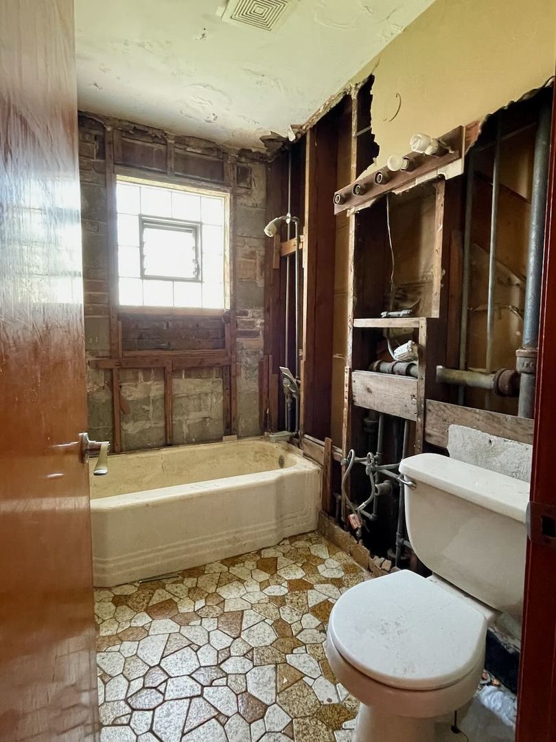 7304 West 57th Street Summit, IL 60501 - Photo 23 of 32 a bathroom with a sink toilet and shower