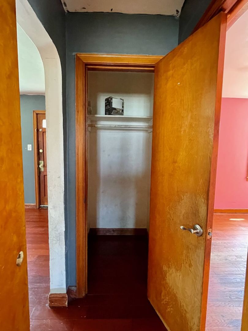 7304 West 57th Street Summit, IL 60501 - Photo 28 of 32 a view of walk in closet with wooden floor