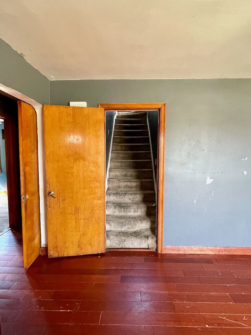 7304 West 57th Street Summit, IL 60501 - Photo 8 of 32 a view of entryway with wooden floor