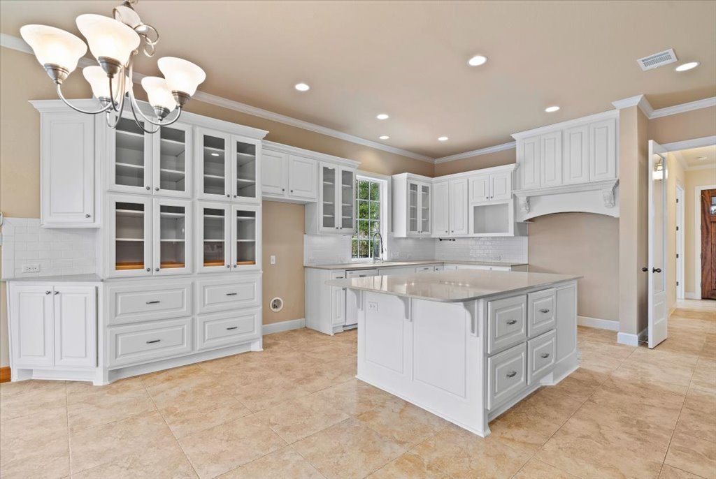 3006 Washington Square Austin, TX 78705 - Photo 12 of 40 a kitchen with granite countertop a stove and cabinets