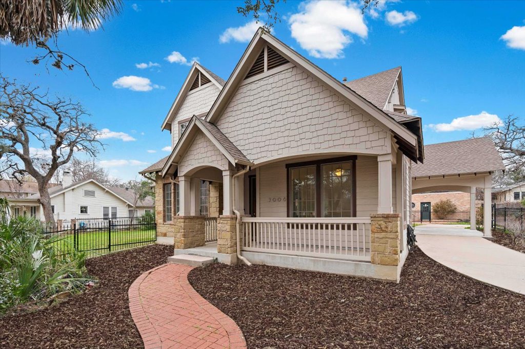 3006 Washington Square Austin, TX 78705 - Photo 2 of 40 a view of a house with a yard