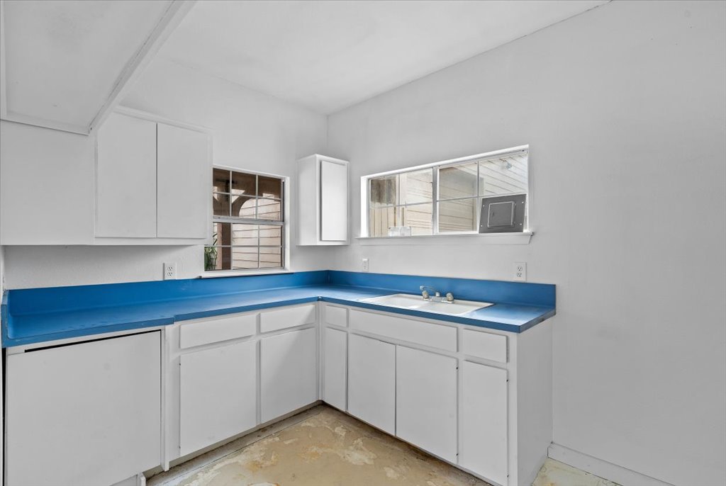 3006 Washington Square Austin, TX 78705 - Photo 31 of 40 a view of a kitchen with cabinets