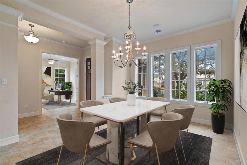 3006 Washington Square Austin, TX 78705 - Photo 4 of 40 a view of a dining room with furniture wooden floor and chandelier