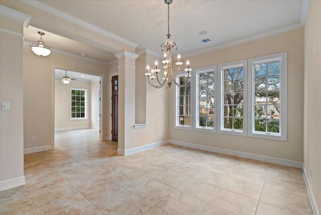 3006 Washington Square Austin, TX 78705 - Photo 5 of 40 a view of a big room with windows and chandelier