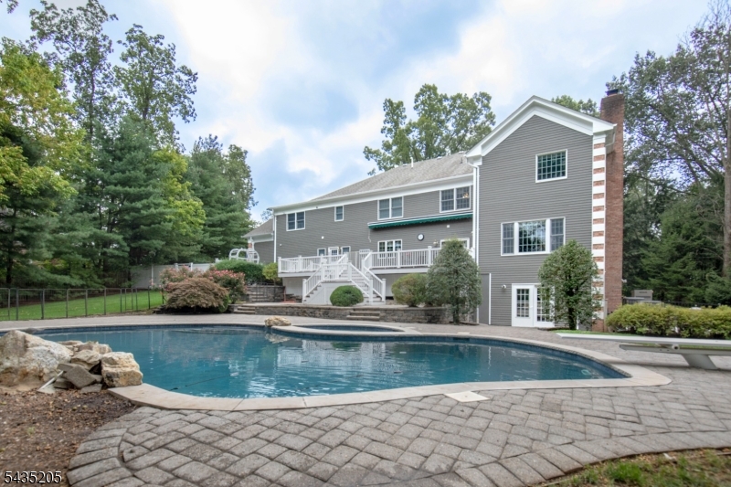 12 Oak Hill Road Bernards, NJ 07920 - Photo 2 of 33 a view of house with swimming pool and a yard