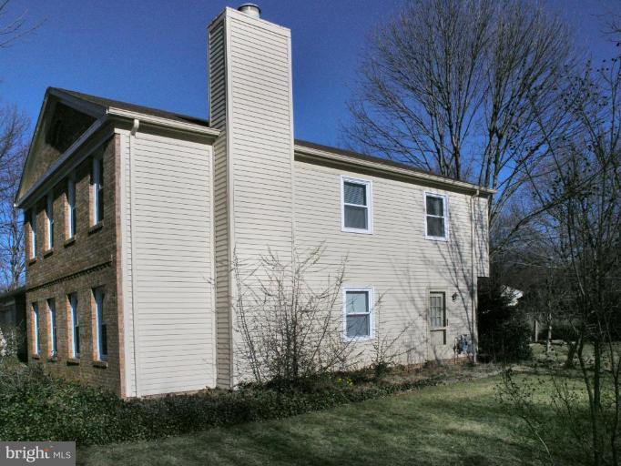12701 Pinecrest Road Herndon, VA 20171 - Photo 25 of 30 a view of a house with a yard