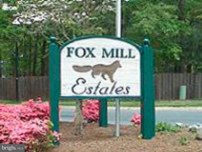 12701 Pinecrest Road Herndon, VA 20171 - Photo 27 of 30 a sign on the side of a building