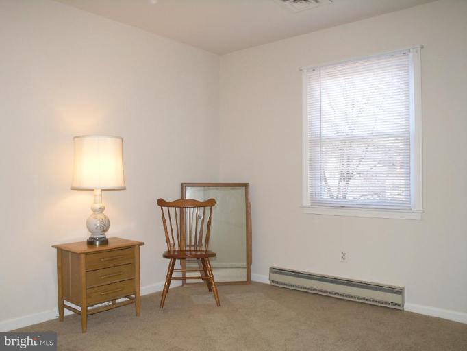 12701 Pinecrest Road Herndon, VA 20171 - Photo 8 of 30 a view of room with window and a couch