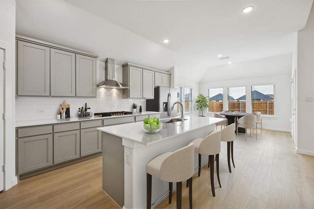 2121 Sunshining Road Princeton, TX 75407 - Photo 6 of 40 Kitchen in the Gilmour II home plan by Trophy Signature Homes – REPRESENTATIVE PHOTO