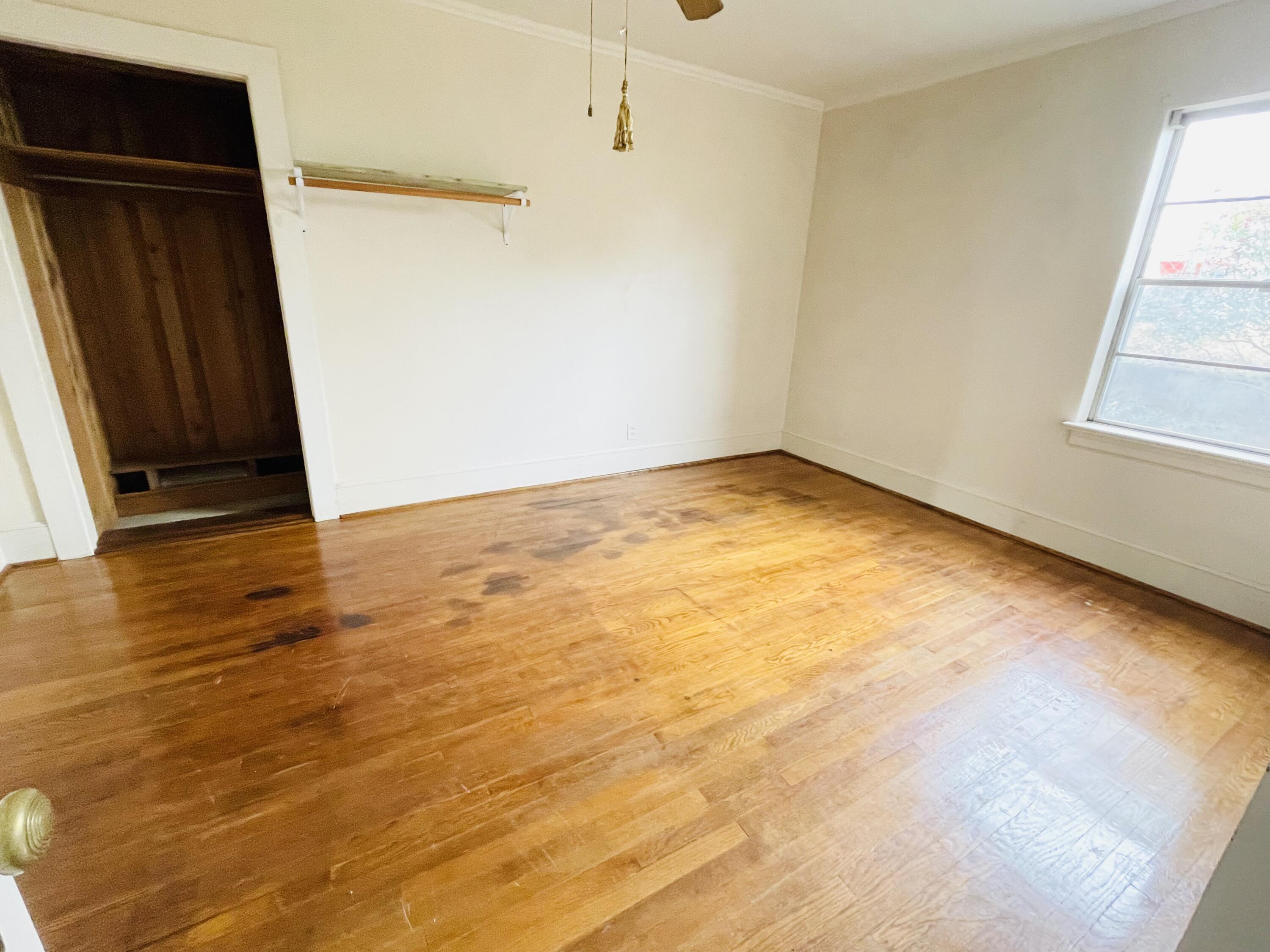 1917 Langdon Road Southwest Roanoke, VA 24015 - Photo 22 of 54 a view of an empty room with wooden floor and a window